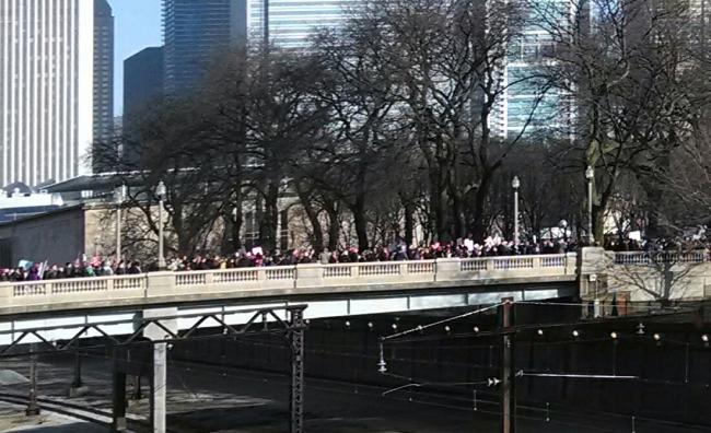 Marchers stream into protest site in Chicago, Jan. 21, 2017
