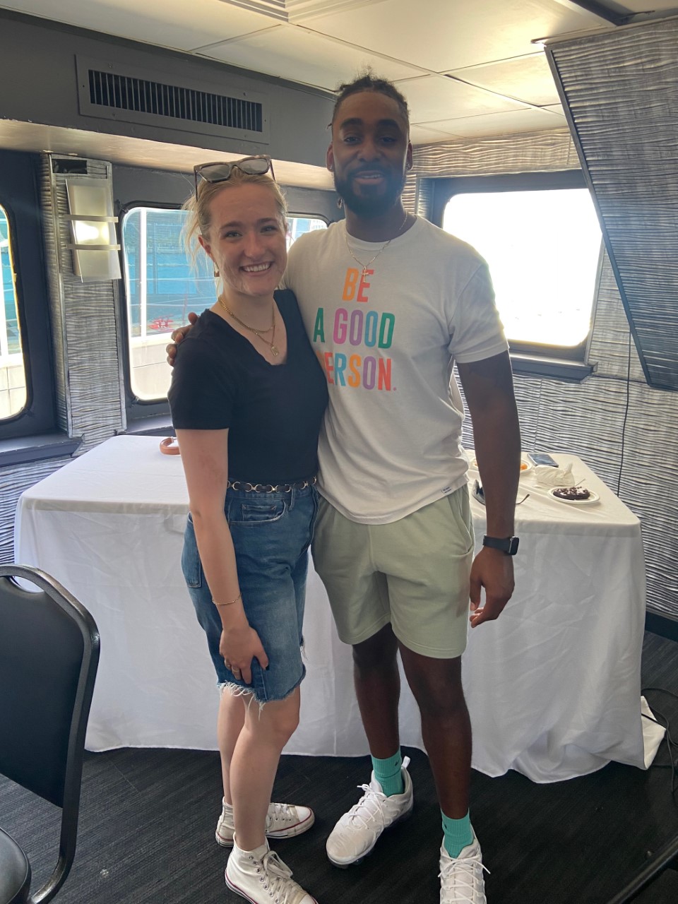 Katie Wozniak CMMA '18 and Isaiah Williams '19 (aka DJ Spoiled Milk) aboard the Anita Dee party boat during Mercy Home's employee appreciation day